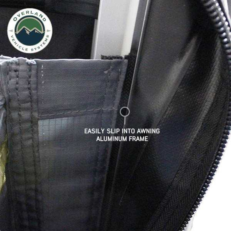 Image of a close-up of an awning room enclosure edge showing grey fabric panel sliding into an aluminum awning frame track with zipper detail, displayed on a white background.