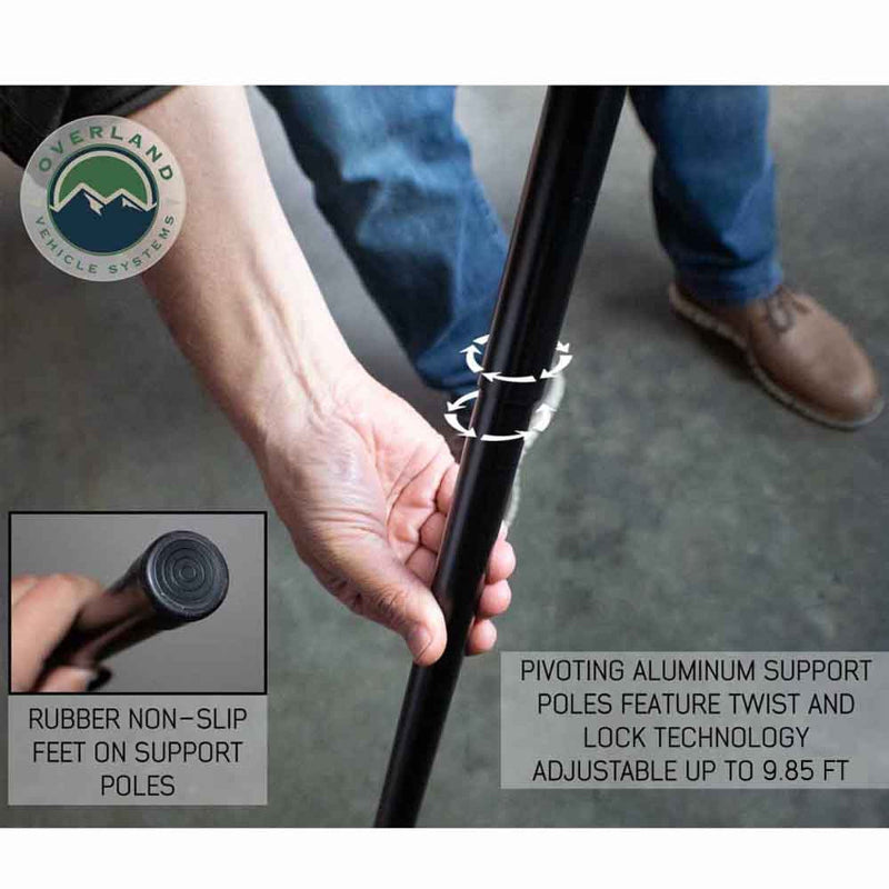 Image of a hand twisting the pivoting aluminum support pole for the OVS Nomadic Awning, demonstrating the twist and lock technology. An inset image shows the rubber non-slip foot at the end of the support pole