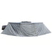Image of the OVS Nomadic 180° Awning with the optional zip-in wall fully deployed, showing the entire length of the awning and wall from a front-facing perspective on a white background