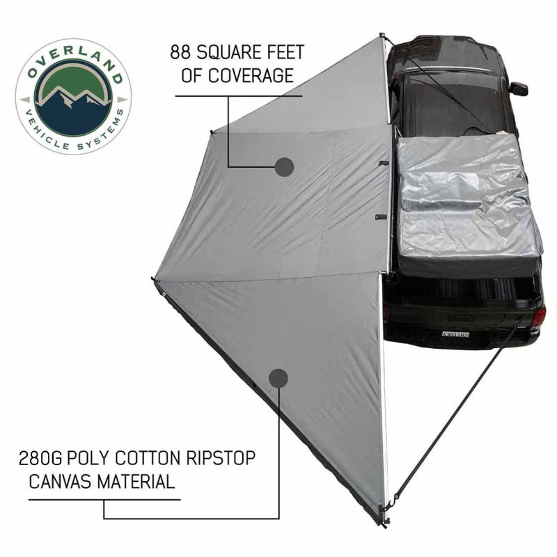 Image of the OVS Nomadic 180° Awning with the optional zip-in wall deployed, showing a top-down view of the gray 280G Poly Cotton Ripstop material and the 88 square feet of coverage