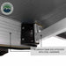 Image of a close-up on the OVS Nomadic 180° Awning's hinge and aluminum frame, highlighting the aluminum frame box extrusion with stainless steel hardware