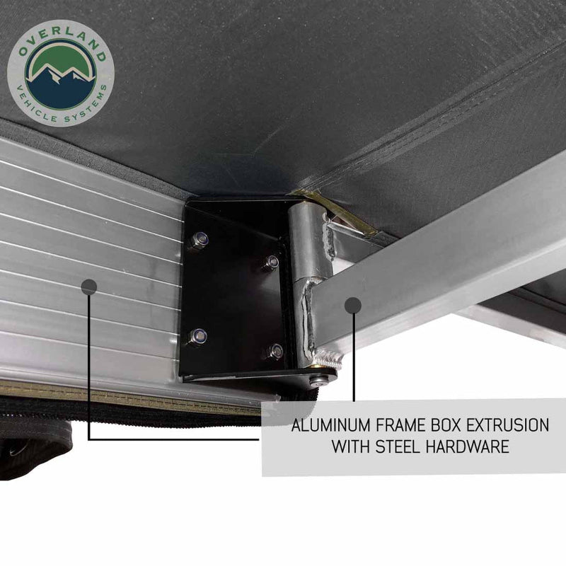 Image of a close-up on the OVS Nomadic 180° Awning's hinge and aluminum frame, highlighting the aluminum frame box extrusion with stainless steel hardware