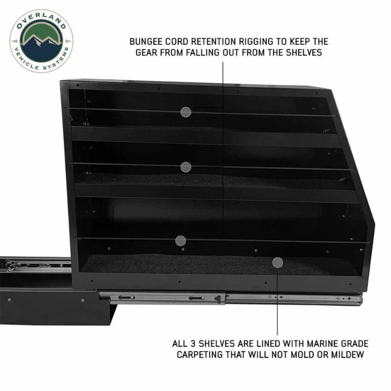 Image of OVS Highline slide-out camping storage system with bungee cord retention rigging and carpet-lined shelves, black steel construction, front view partially extended on white background.