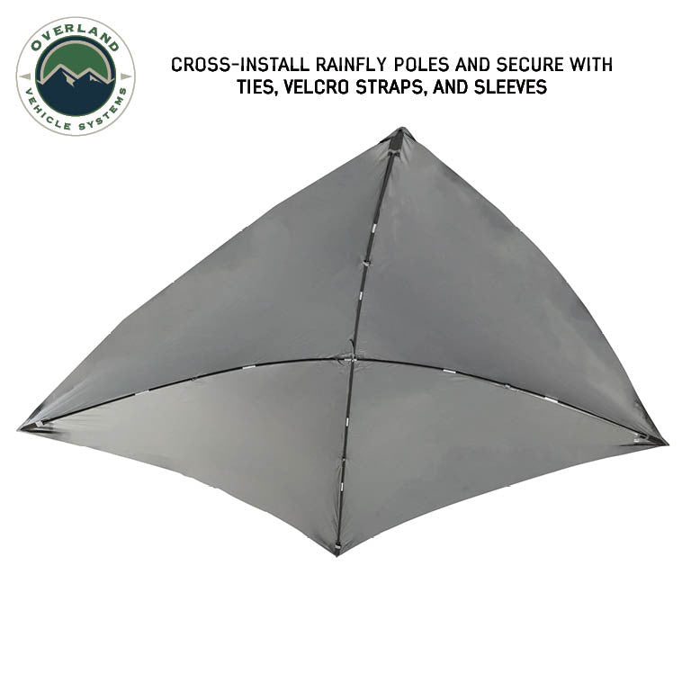 Image of OVS hub-style camping tent rainfly fully assembled with cross-installed support poles, gray waterproof fabric, top-down angled view on a white background.