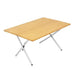Image of OVS Kick It bi-fold camp table with natural wood tabletop and silver folding legs, lightweight portable design shown in an angled front view on a white background.