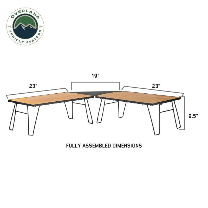 Image of modular folding camp table system with light wood tabletops and black metal legs showing fully assembled dimensions, angled front and side view on white background.