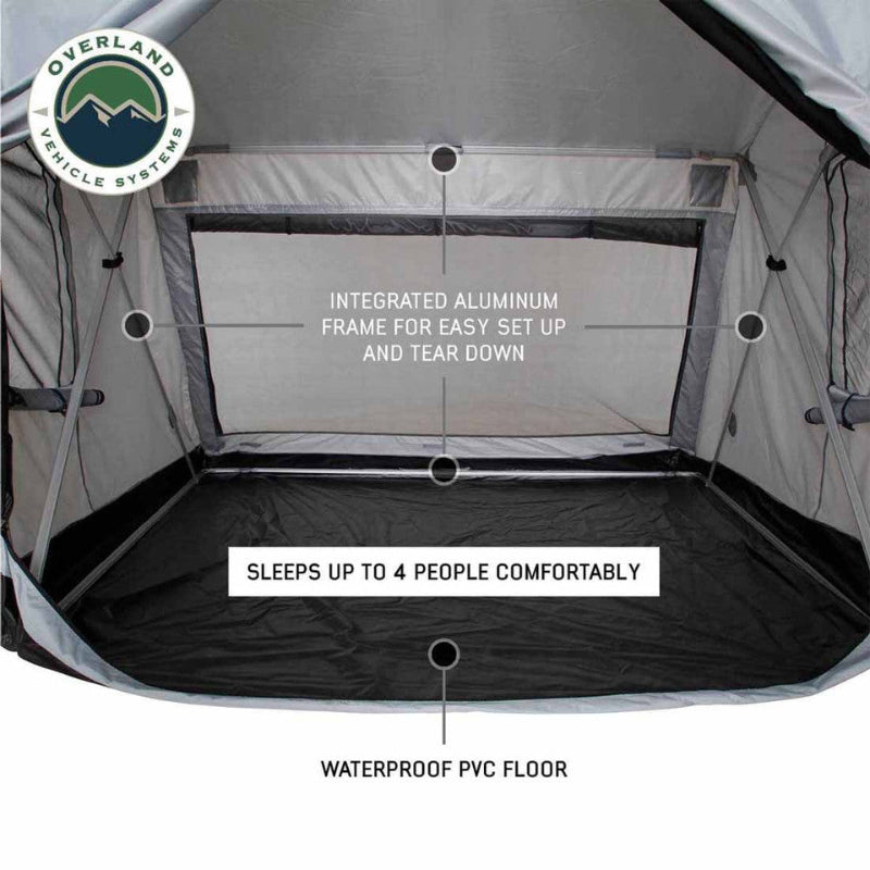 A view of the tent's interior from the entrance, highlighting its features. The image points out the integrated aluminum frame, waterproof PVC floor, and that it "Sleeps Up to 4 People Comfortably"