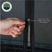 A close-up of a hand zipping up the tent's mesh door, demonstrating the heavy-duty SBS zippers. The image highlights the heavy-duty SBS zippers for reliable performance.
