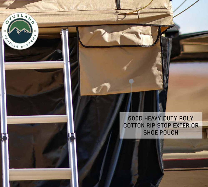 Image of a tent's exterior shoe pouch made from 600D heavy-duty poly cotton rip stop fabric, shown next to a ladder.