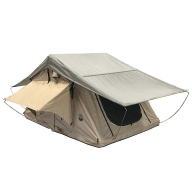 Image of a beige rooftop tent with a gray rainfly deployed, set against a white background.