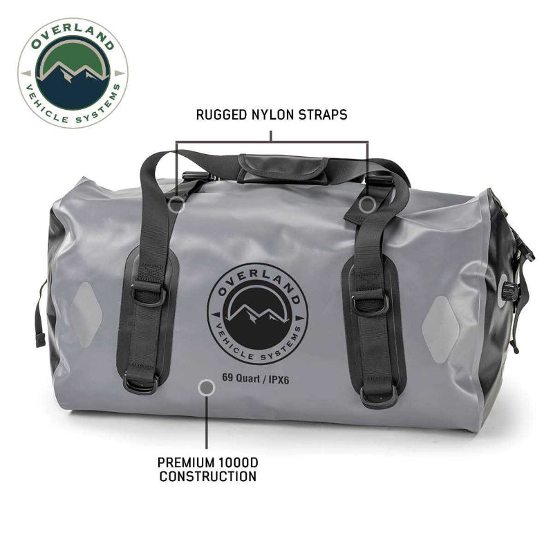 Image of a gray 69-quart Overland Vehicle Systems IPX6 waterproof duffel bag, highlighting its rugged nylon straps and premium 1000D construction.