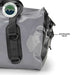 Image of a gray and black Overland Vehicle Systems IPX6 waterproof duffel bag, showing a close-up of its air release valve on the side.