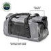 Image of a gray and black Overland Vehicle Systems IPX6 waterproof duffel bag, highlighting its heavy-duty buckles and external storage pocket with a heavy-duty zipper.