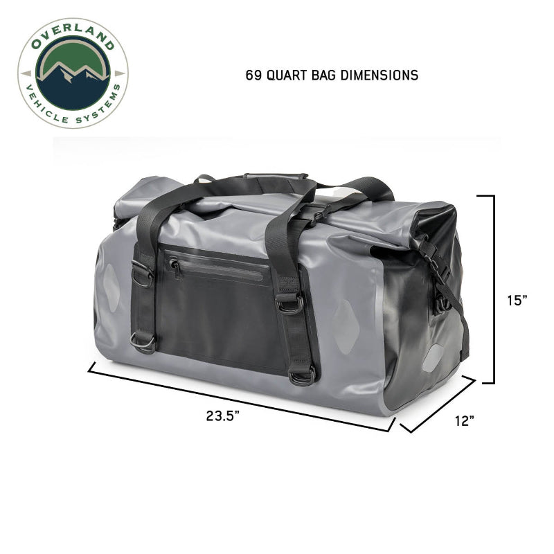 Image of a gray and black 69-quart Overland Vehicle Systems IPX6 waterproof duffel bag, showing its dimensions as 23.5" long, 12" wide, and 15" high.