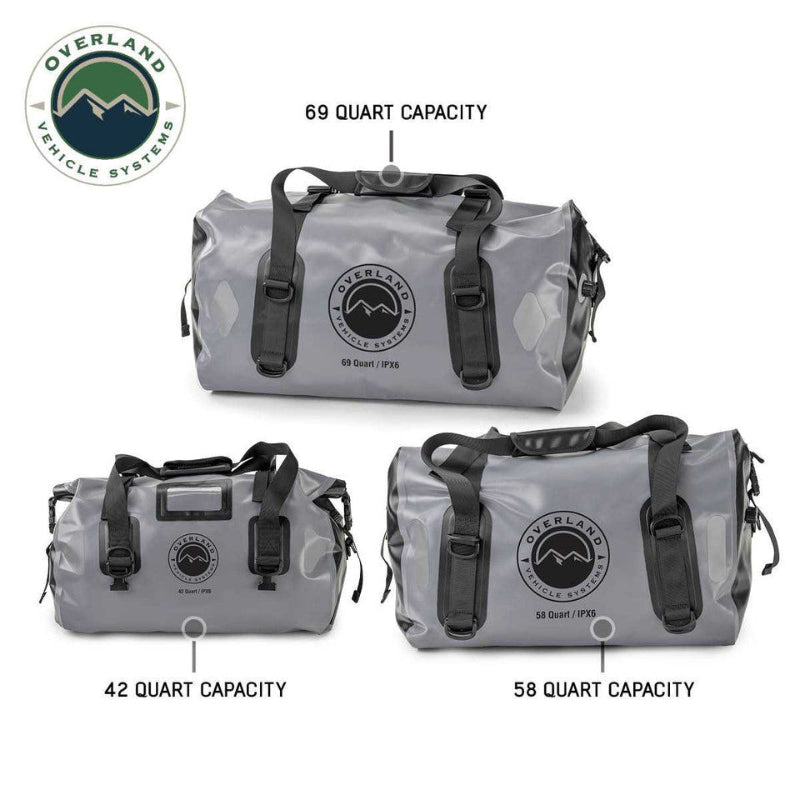Image of three gray Overland Vehicle Systems IPX6 waterproof duffel bags, labeled with their capacities: 69 Quart, 42 Quart, and 58 Quart, displayed on a white background.