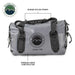 Image of a gray 58-quart Overland Vehicle Systems IPX6 waterproof duffel bag, highlighting its rugged nylon straps and premium 1000D construction.