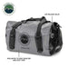 Image of a gray and black 58-quart Overland Vehicle Systems IPX6 waterproof duffel bag, highlighting its air release valve and IPX6 rating to keep gear dry and dust-free.