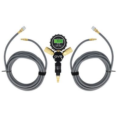 An image of an Overland Vehicle Systems (OVS) D.T.D. digital tire deflator kit. The kit features a central black manifold with a green digital pressure gauge displaying "30.0 PSI," connected to two coiled gray air hoses with brass fittings and universal quick connect chucks. The setup is presented against a clean white background