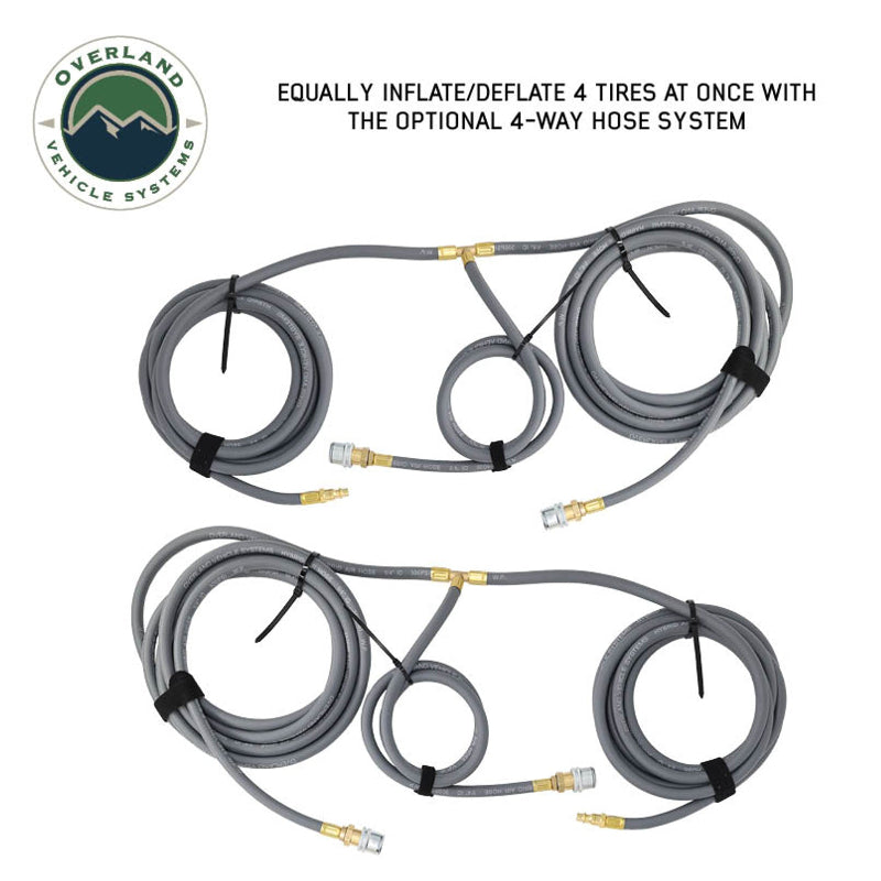 An image displaying two sets of gray air hoses for the Overland Vehicle Systems (OVS) 4-way tire inflation/deflation system. Each set consists of a main hose branching into two shorter hoses, all equipped with brass fittings and quick connect chucks, neatly coiled and secured with straps. The text at the top states "EQUALLY INFLATE/DEFLATE 4 TIRES AT ONCE WITH THE OPTIONAL 4-WAY HOSE SYSTEM."