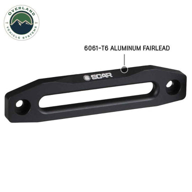 Image of OVS 6061-T6 aluminum winch fairlead with black powder coat and clear finish, angled front and side view highlighting smooth tapered slot and mounting holes on a white background.