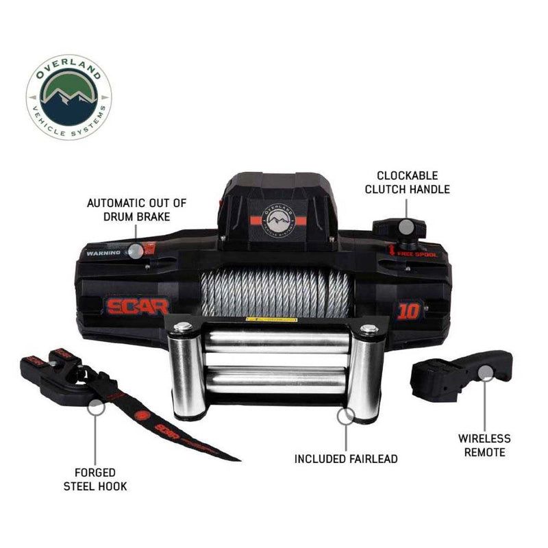 An infographic-style image of the Overland Vehicle Systems (OVS) SCAR Series Winch on a white background. The image uses callouts to label key features, including the automatic out of drum brake, clockable clutch handle, forged steel hook, included fairlead, and wireless remote