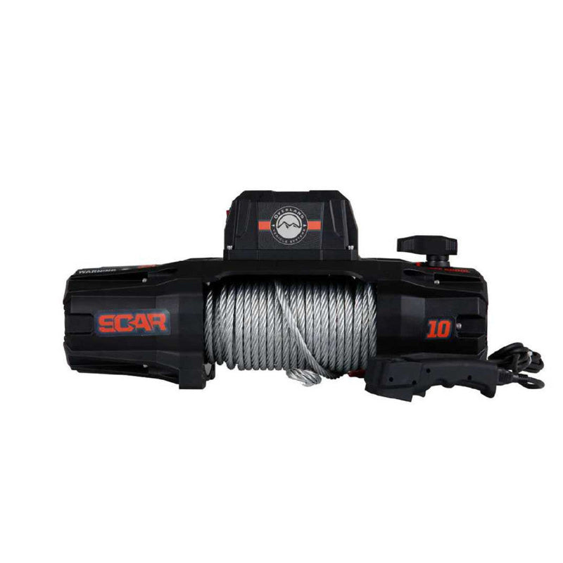 A frontal view of the black and orange Overland Vehicle Systems (OVS) SCAR Series Winch on a white background. The winch is displayed with its synthetic rope spooled, and the wired remote control is placed next to it