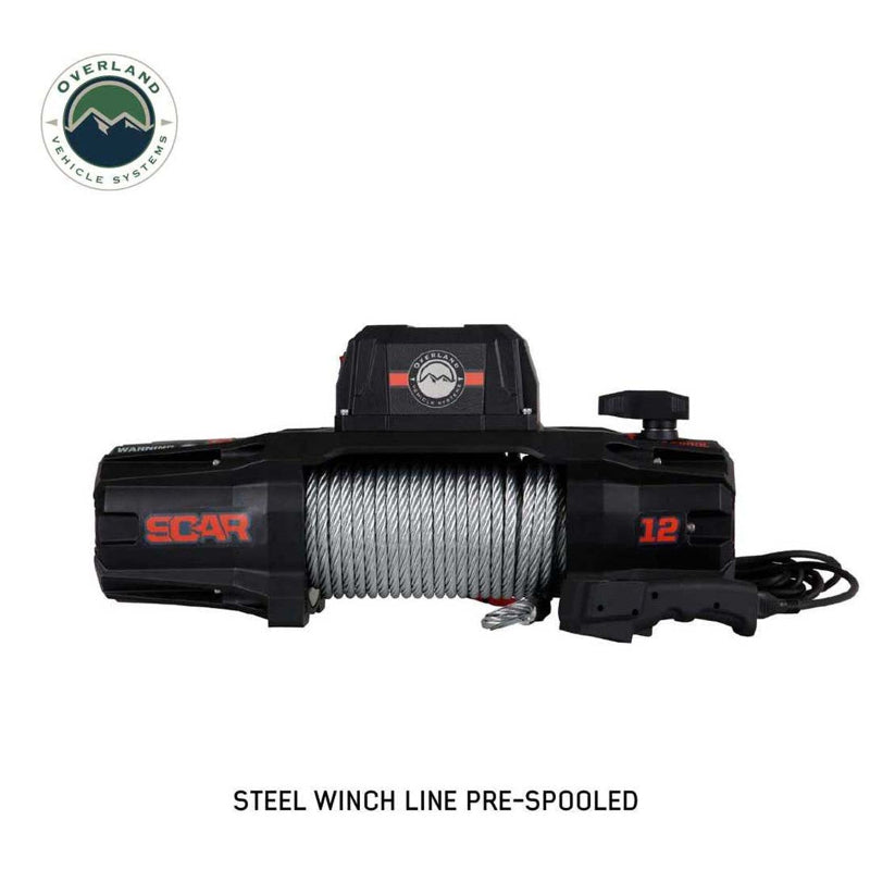 Image of an OVS SCAR 12 Steel Cable Winch, front view on a white background, with a steel winch line pre-spooled. The black winch has "SCAR" and "12" printed on it, and a remote controller is visible on the right