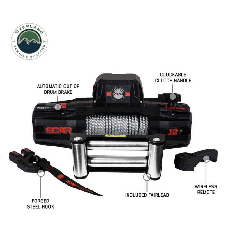 Image of the OVS SCAR 12 Steel Cable Winch and its components laid out on a white background, with labels pointing to each part. The main winch unit with a steel cable is in the center, flanked by a forged steel hook, an included fairlead, and a wireless remote