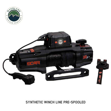Black OVS SCAR Synthetic Rope Winch on a white background. The winch is shown with a wired remote and a shackle, highlighting that the synthetic winch line is pre-spooled