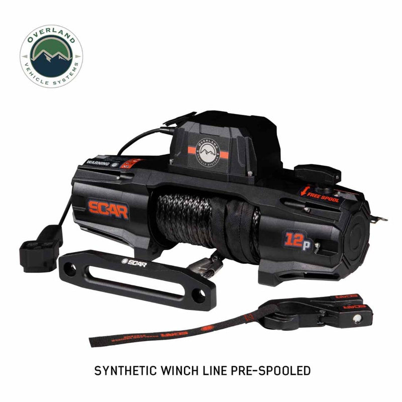 Image of the black Overland Vehicle Systems (OVS) SCAR winch with a red '12p' and a close-up on the pre-spooled synthetic winch line. The winch includes a hook, remote, and strap, all on a white background