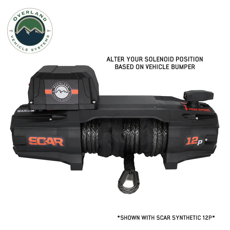 Image of the Overland Vehicle Systems (OVS) SCAR winch, showing a front view of the black winch with the synthetic rope wound around the spool. The image highlights the adjustable solenoid position with an inset text description on a white background