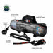 Image of the black Overland Vehicle Systems (OVS) SCAR winch, with a transparent overlay showing the internal components, including the 6.5 HP series wound motor and the 3-stage planetary gear system. Labels point to the internal parts, wireless remote, included fairlead, and forged steel hook