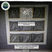 Image showing the interior ceiling of a rooftop tent, featuring a total of 8 mesh overhead removable velcro storage pockets, including one clear removable velcro storage pouch, all against a dark grey fabric background. The "Overland Vehicle Systems" logo is in the top left corner