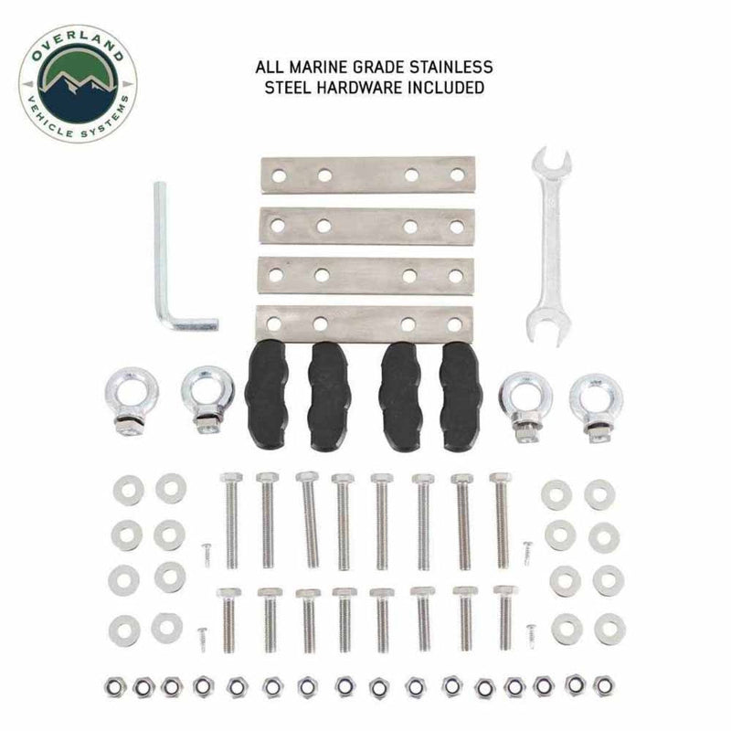 Image showcasing a collection of all marine-grade stainless steel hardware included with an Overland Vehicle Systems product, laid out on a white background. The hardware includes various bolts, nuts, washers, brackets, eye bolts, an L-wrench, and a spanner