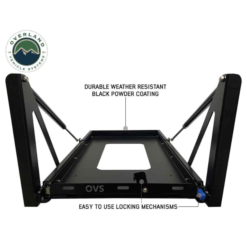 Image of heavy-duty refrigerator slide mount with gas strut arms and locking mechanism, black powder-coated steel frame shown fully extended, front-facing view on white background.