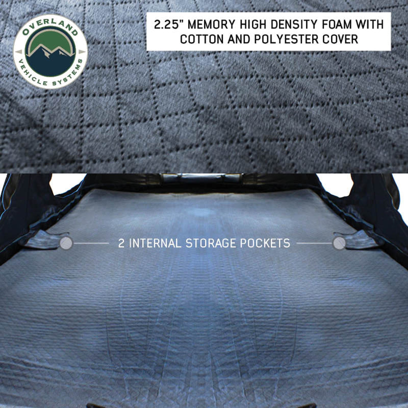 Image of the Overland Vehicle Systems Khumbu 2-person Soft Shell Tent's interior showing the 2.25-inch thick memory foam mattress with cotton and polyester cover. The image also highlights the two internal storage pockets on a white background