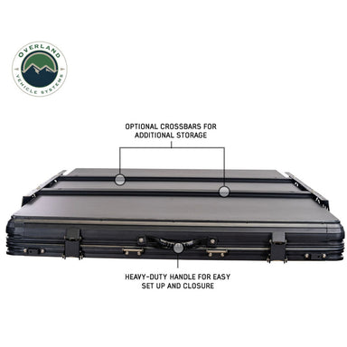 Image of Overland Vehicle Systems rooftop tent with optional crossbars for additional storage and a heavy-duty handle for easy setup and closure, top-down view on a white background