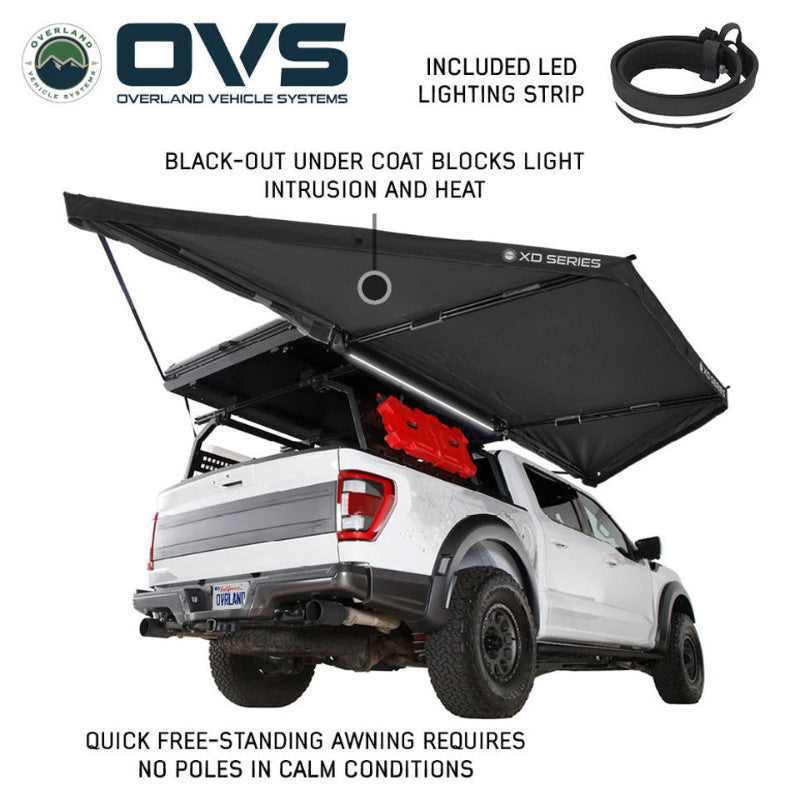 Image of a white pickup truck with a black XD Series awning fully deployed, highlighting its included LED lighting strip and black-out undercoat, along with an inset of the lighting strip.