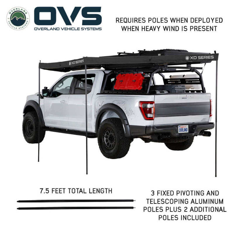 Image of a white pickup truck with an XD Series awning fully deployed and supported by telescoping aluminum poles, demonstrating the 7.5 feet total length and the inclusion of three fixed pivoting and telescoping poles plus two additional poles.