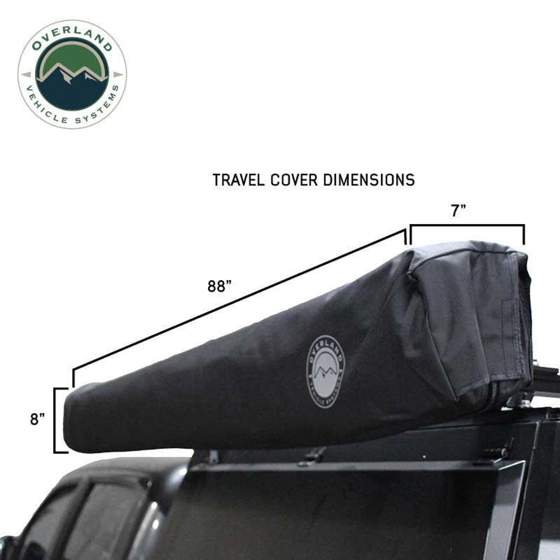 Image displaying a black Overland Vehicle Systems 270-degree awning fully deployed from the side of a dark grey pickup truck, with three fixed pivoting and telescoping aluminum poles that expand up to 8.5 feet long providing support. The "Overland Vehicle Systems" logo is in the top left corner