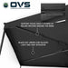 Image of an OVS XD Nomadic 270 LTE awning showing black fabric with blackout undercoat and Velcro-secured support poles stored along the arms, displayed in angled underside view on a white background.