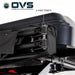 Image of a close-up of an OVS XD Nomadic 270 LTE awning hinge assembly showing dual pivot points and reinforced hardware mounted to a roof rack, displayed in detail on a white background.