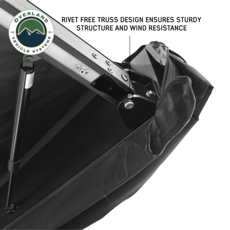Image of the OVS Nomadic Awning showcasing the rivet-free truss design, ensuring a sturdy structure for the dark fabric