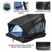 Image showcasing an Overland Vehicle Systems Sherpa Roof Top Tent, fully deployed with a black exterior and blue interior, highlighting features like support struts for the rainfly, an integrated skylight, and an elevated interior mesh screen to prevent condensation. The tent is shown at an angle on a white background