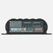 Image of the front face of a REDARC BCDC Classic 50A Battery Charger on a gray background. The product's label is visible, showing the model number BCDC1250D, charge profiles, and charge status indicators