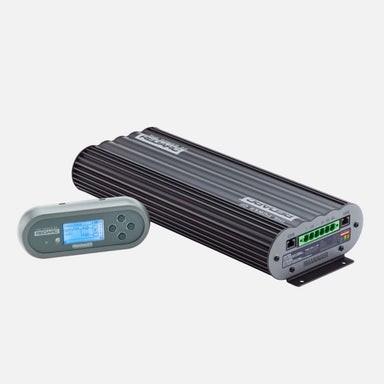 Image of Redarc Manager30 battery management system with display screen, black aluminum housing with ribbed texture, visible input/output ports, angled front and side view on white background