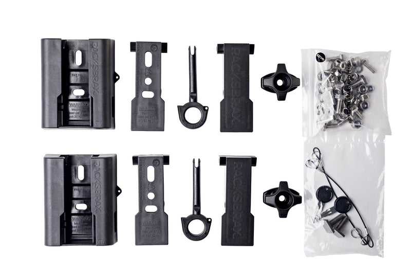 Image of RACKSBARX HD HITCH components laid out on a white background, including two main black bracket units, various smaller black attachment pieces, two black thumb screws, a clear bag of nuts and bolts, and a clear bag with keys and lanyards.