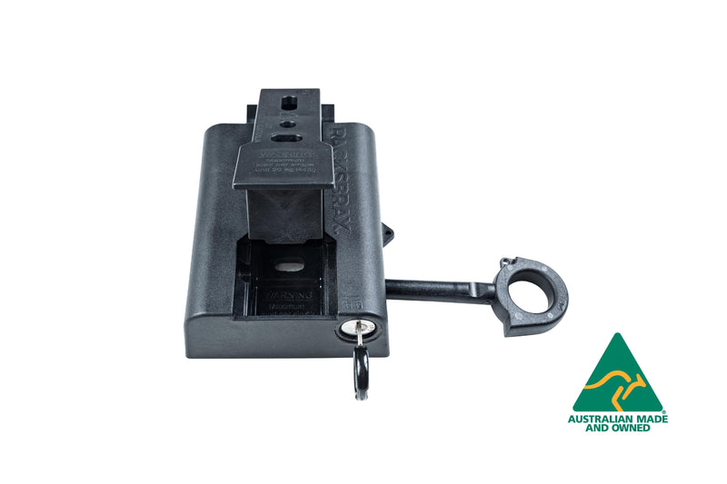 Image of a black RACKS BRAX HD HITCH component with a key inserted and an Australian Made and Owned logo, viewed from a slightly higher angle on a white background.