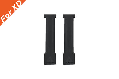 Image of two black RacksBrax XD cover parts, rectangular mounting covers with embossed logo, front view displayed side by side on white background.