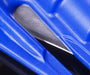 Image is a close-up of the blue Resqme tool, highlighting the silver blade used for cutting seatbelts.